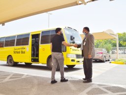 GR-12-Boys giving donation at Sharjah City for HumanitarianServices